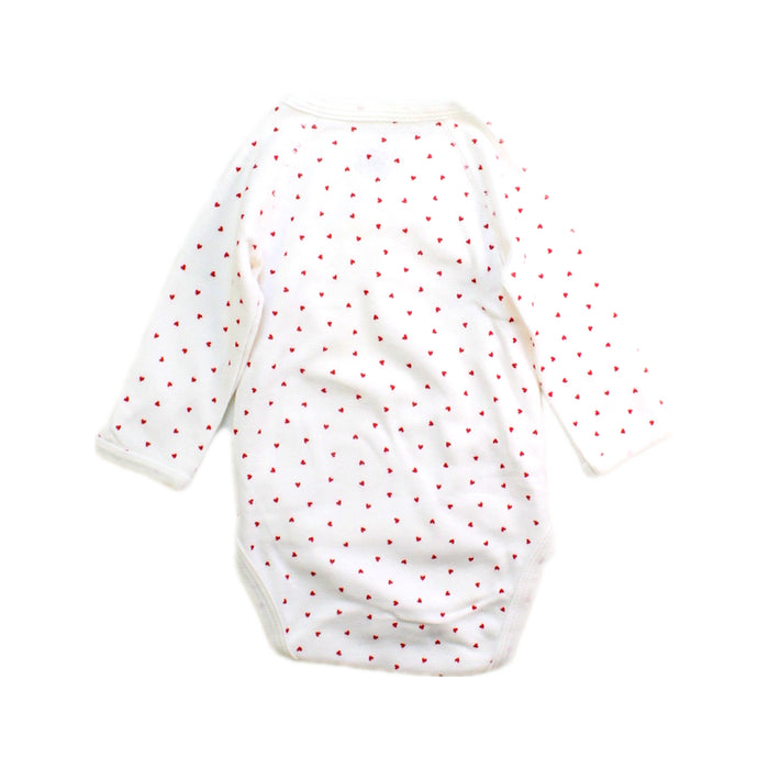 A White Long Sleeve Bodysuits from Petit Bateau in size 0-3M for girl. (Back View)