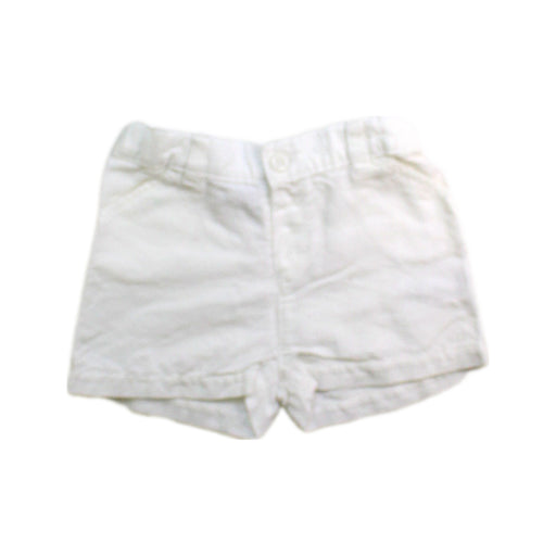 A White Shorts from Petit Bateau in size 6-12M for neutral. (Front View)