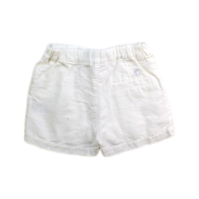 A White Shorts from Petit Bateau in size 6-12M for neutral. (Back View)