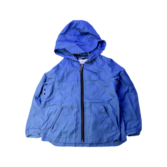 A Blue Rain Jackets from Burberry in size 4T for girl. (Front View)