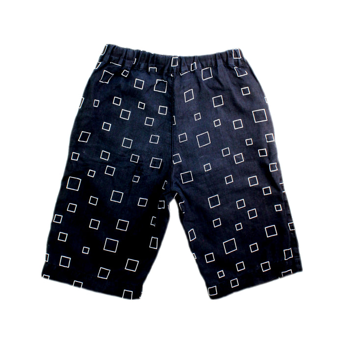 A Black Shorts from Agnes B Enfant in size 6T for boy. (Back View)