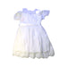 A White Short Sleeve Dresses from Paisley of London in size 4T for girl. (Front View)