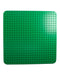 A Green Lego & Building Blocks from LEGO in size 4T for neutral. (Front View)