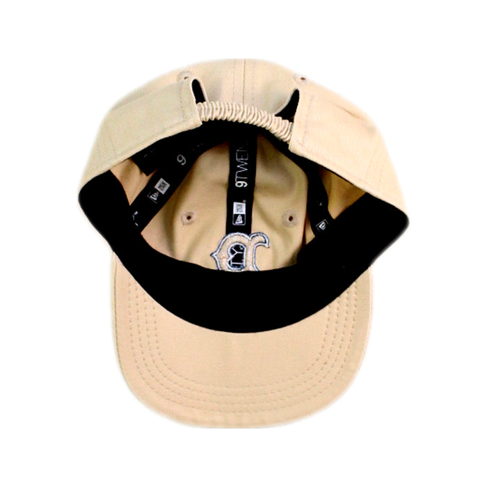 A Beige Caps from New Era in size 6-12M for neutral. (Back View)