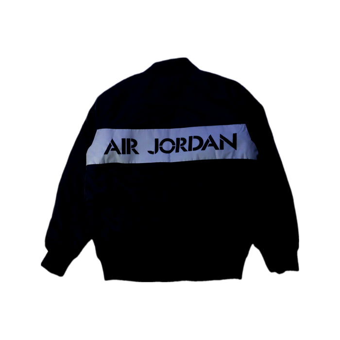 A Black Lightweight Jackets from Air Jordan in size 6T for boy. (Back View)