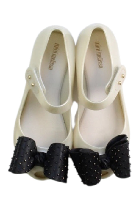 A Ivory Flats from Mini Melissa in size 6T for girl. (Back View)