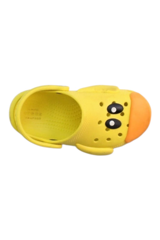 A Yellow Slip Ons from Crocs in size 3T for neutral. (Front View)
