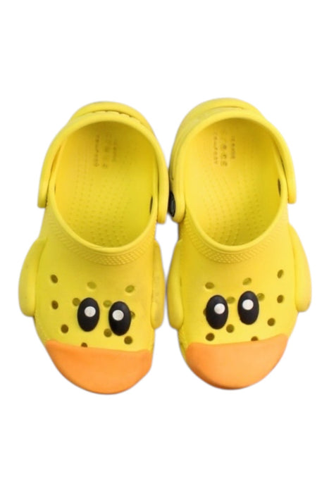 A Yellow Slip Ons from Crocs in size 3T for neutral. (Back View)