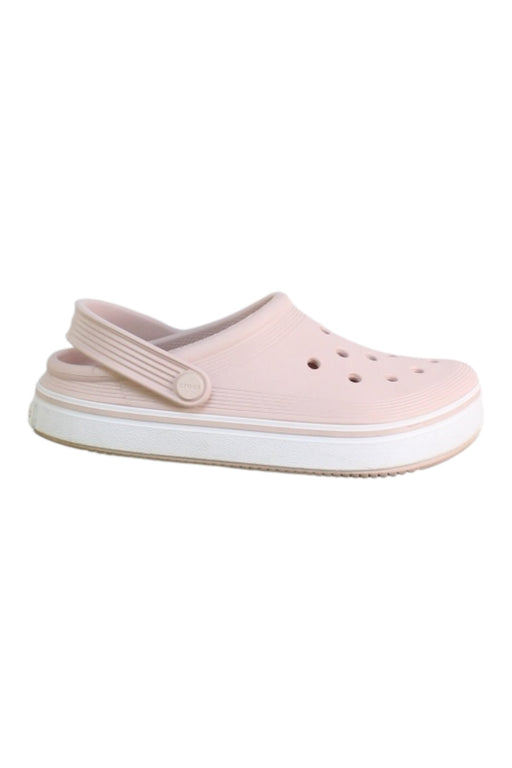 A Pink Slip Ons from Crocs in size 6T for girl. (Front View)