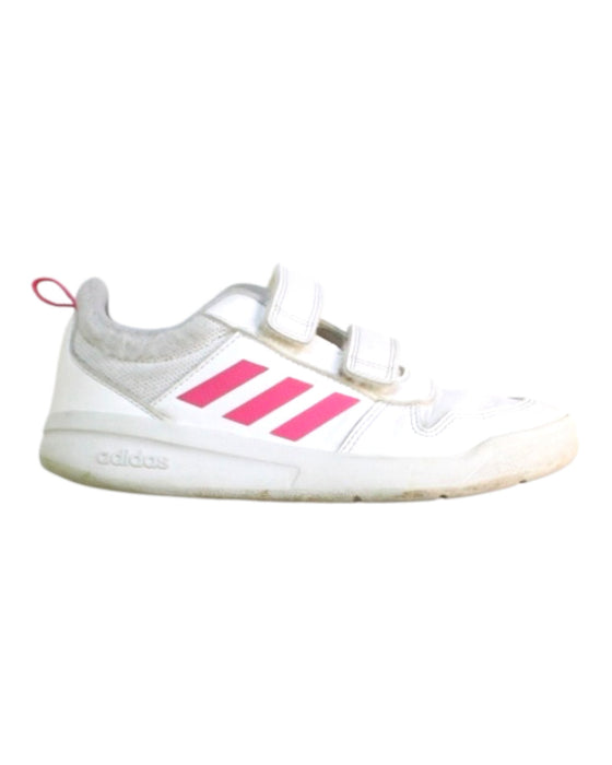 A White Sneakers from Adidas in size 7Y for girl. (Front View)