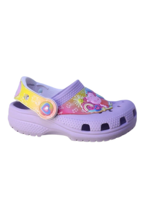 A Pink Slip Ons from Crocs in size 18-24M for girl. (Front View)