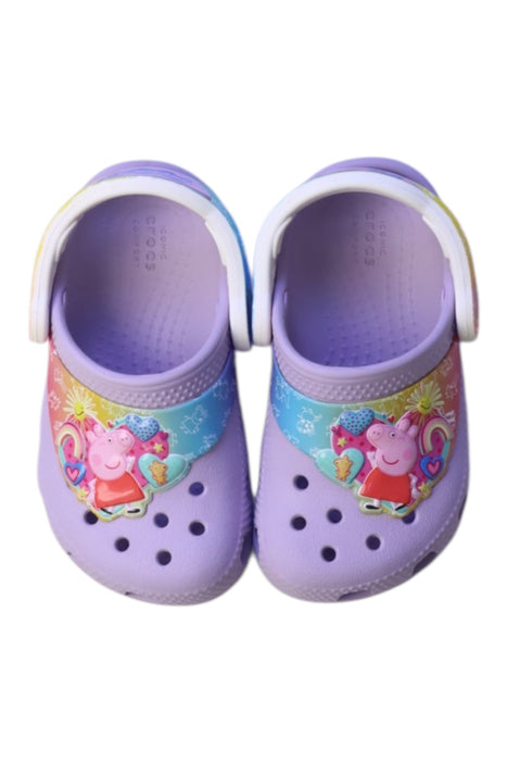 A Pink Slip Ons from Crocs in size 18-24M for girl. (Back View)