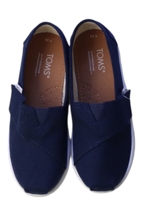 A Navy Slip Ons from Toms in size 5T for boy. (Back View)