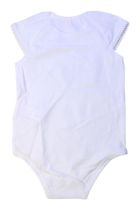 A White Sleeveless Bodysuits from Original Marines in size 6-12M for girl. (Back View)