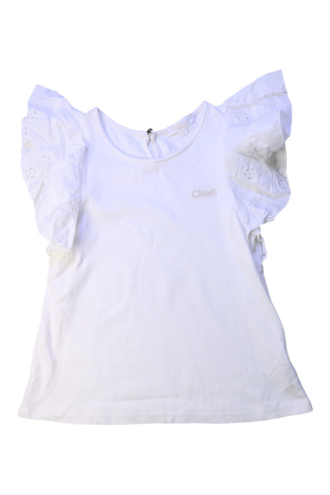 A White Short Sleeve Tops from Chloe in size 8Y for girl. (Front View)