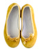 A Yellow Flats from Pepa London in size 5T for girl. (Back View)