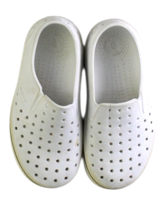 A White Slip Ons from Native Shoes in size 6T for boy. (Back View)
