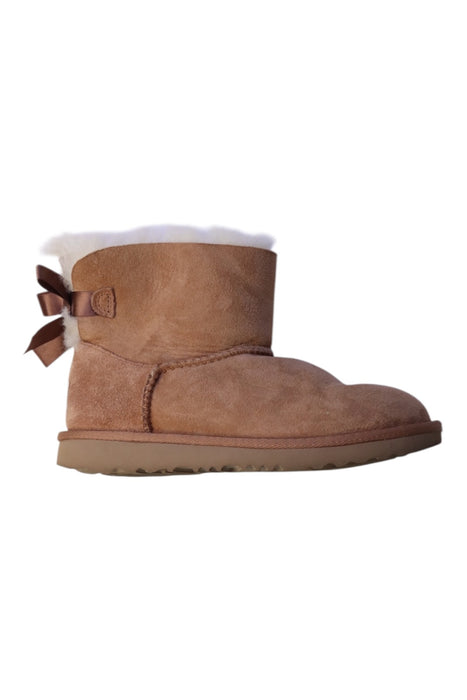 A Brown Booties from UGG in size 6T for girl. (Front View)