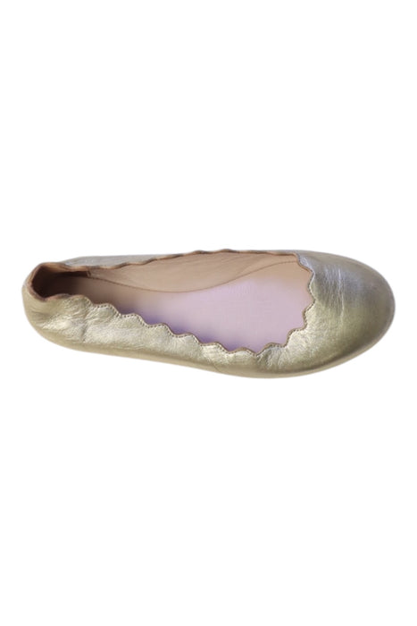 A Gold Flats from Chloe in size 6T for girl. (Front View)