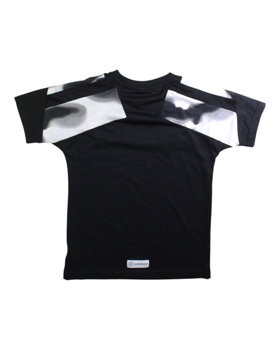 A Black Short Sleeve T Shirts from Adidas in size 7Y for boy. (Back View)