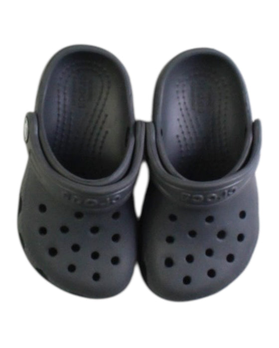 A Grey Slip Ons from Crocs in size 18-24M for neutral. (Back View)