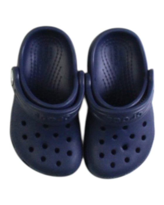 A Navy Slip Ons from Crocs in size 12-18M for neutral. (Back View)