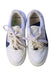 A White Sneakers from Nike in size 12Y for girl. (Back View)