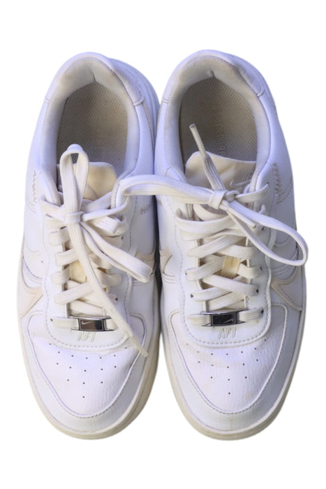 A White Sneakers from Nike in size 12Y for girl. (Back View)