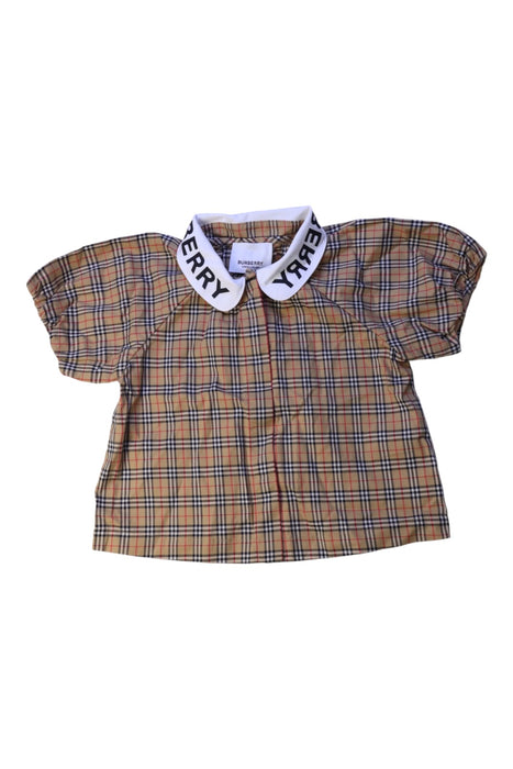 A Beige Short Sleeve Tops from Burberry in size 6-12M for girl. (Front View)