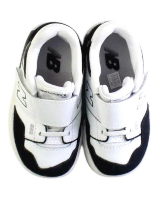 A Black Sneakers from New Balance in size 18-24M for boy. (Back View)