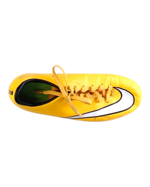 A Yellow Cleats/Soccer Shoes from Nike in size 12Y for boy. (Front View)