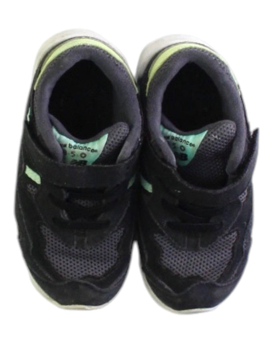 A Black Sneakers from New Balance in size 3T for boy. (Back View)
