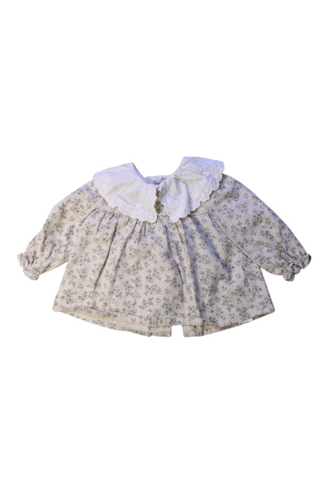 A Beige Long Sleeve Tops from Louisiella in size 6-12M for girl. (Front View)