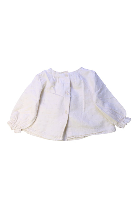 A White Long Sleeve Tops from Nanos in size 6-12M for girl. (Back View)