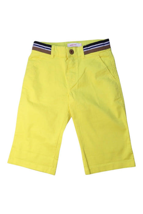 A Yellow Shorts from Catimini in size 7Y for boy. (Front View)
