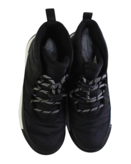 A Black Winter Boots from Sorel in size 7Y for neutral. (Back View)