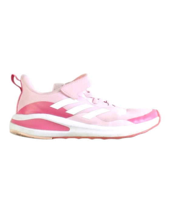 A Pink Sneakers from Adidas in size 7Y for girl. (Front View)