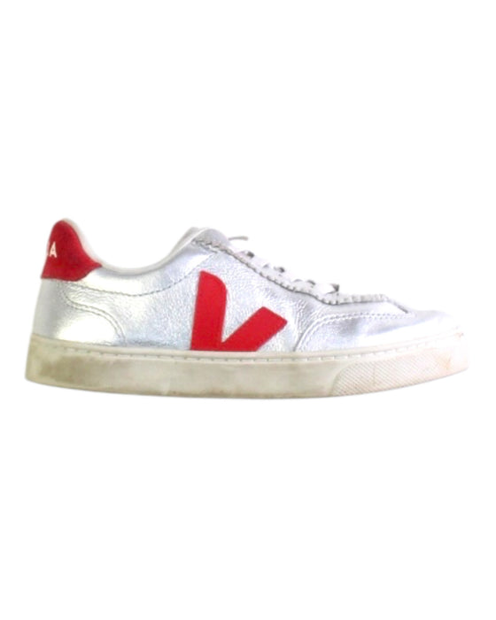 A Red Sneakers from Veja in size 7Y for girl. (Front View)