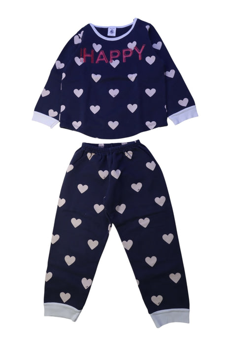 A Navy Pyjama Sets from Petit Bateau in size 3T for girl. (Front View)
