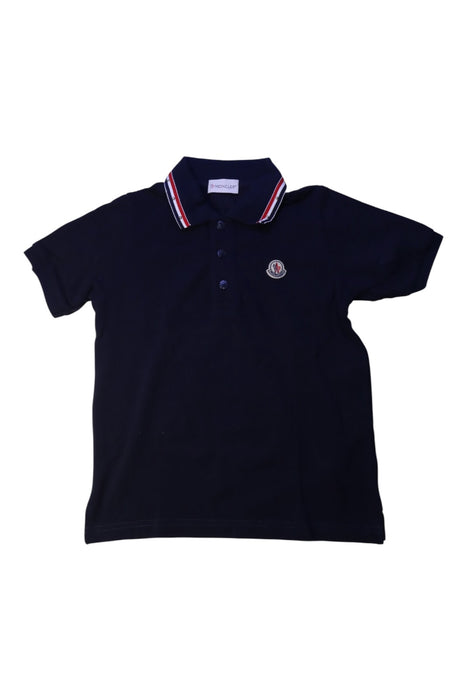 A Navy Short Sleeve Polos from Moncler in size 6T for boy. (Front View)