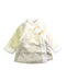 A White Coats from Mides in size 12-18M for girl. (Front View)