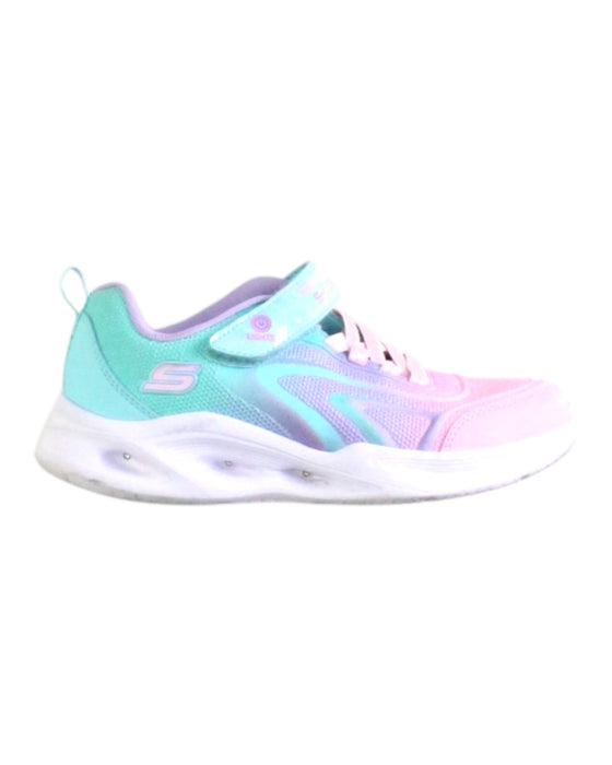A Pink Sneakers from Skechers in size 7Y for girl. (Front View)