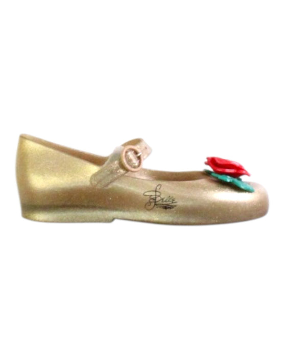 A Gold Flats from Mini Melissa in size 5T for girl. (Front View)