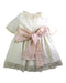 A Ivory Long Sleeve Dresses from Nanos in size 6T for girl. (Back View)