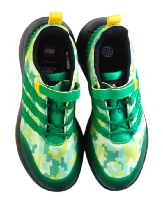 A Green Sneakers from Adidas in size 12Y for boy. (Back View)