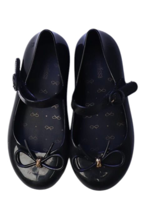 A Black Flats from Mini Melissa in size 4T for girl. (Back View)