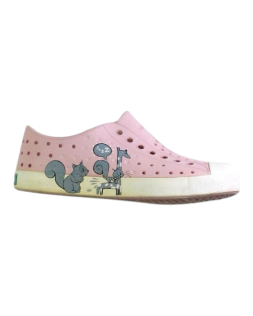 A Pink Slip Ons from Native Shoes in size 7Y for girl. (Front View)