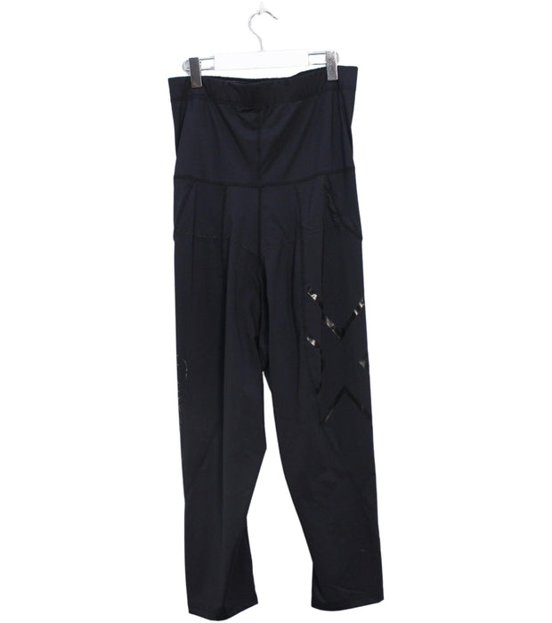 A Black Leggings from 2XU in size M for maternity. (Back View)