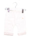 A White Casual Pants from Noukie's in size 0-3M for boy. (Front View)