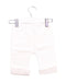 A White Casual Pants from Noukie's in size 0-3M for boy. (Back View)